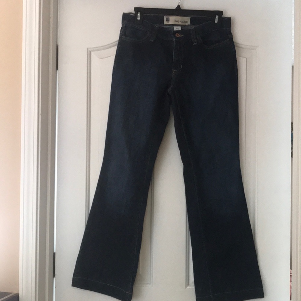 Dark wash, wide leg jeans with stretch.